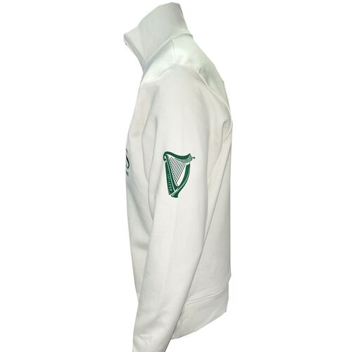 White long-sleeve shirt with green harp emblem on the sleeve