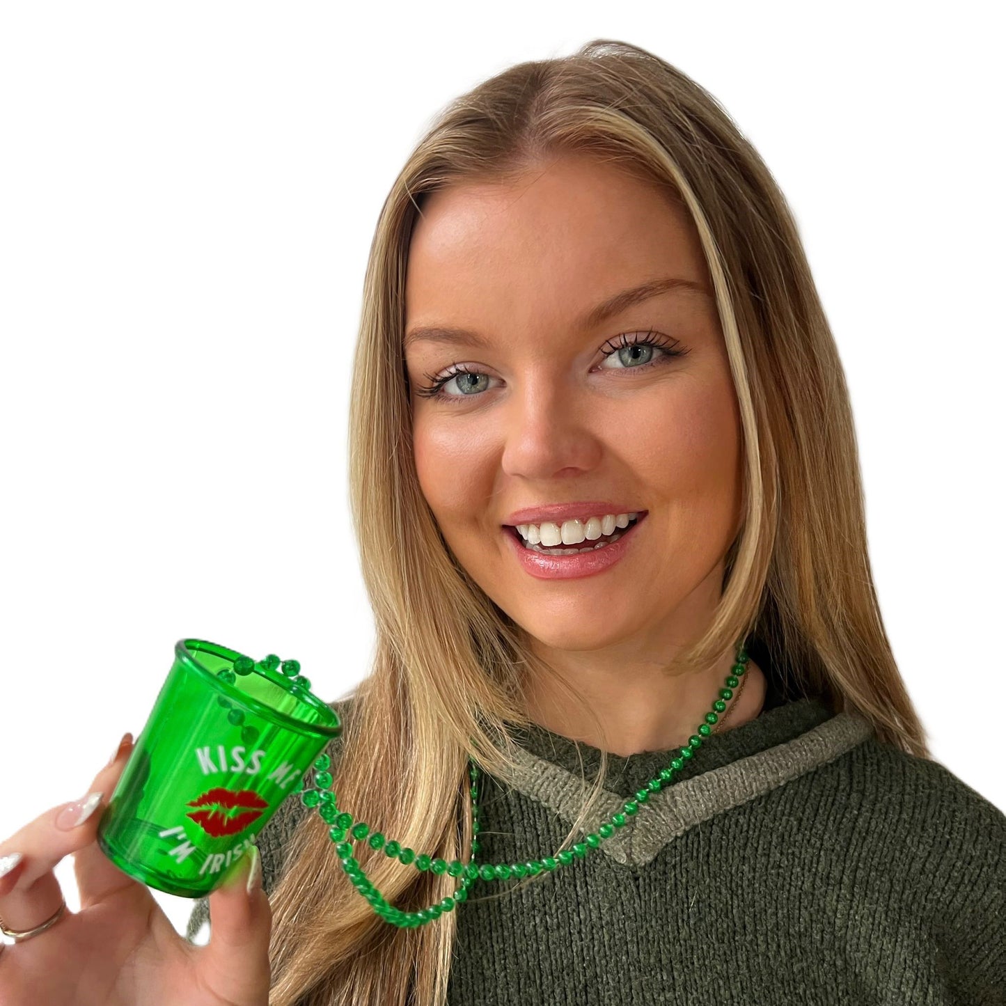 Smiling woman holding green cup with beads necklace and text