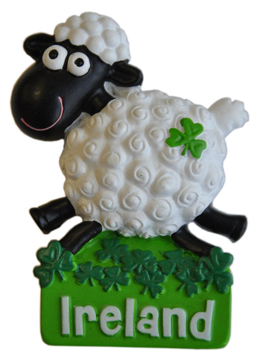 Cartoon sheep with white wool and black face standing on green base