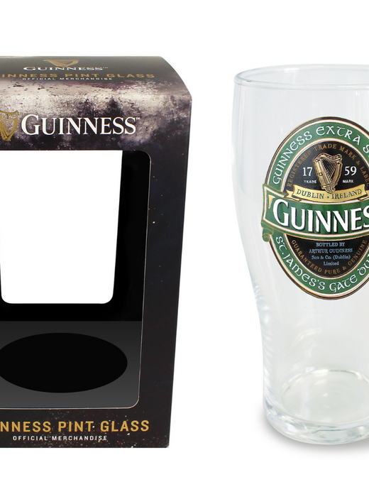 Clear pint glass with Guinness logo and empty black packaging box