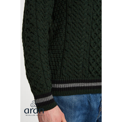 Dark green Merino Aran sweater with cable knit texture and striped ribbed hem and cuffs.