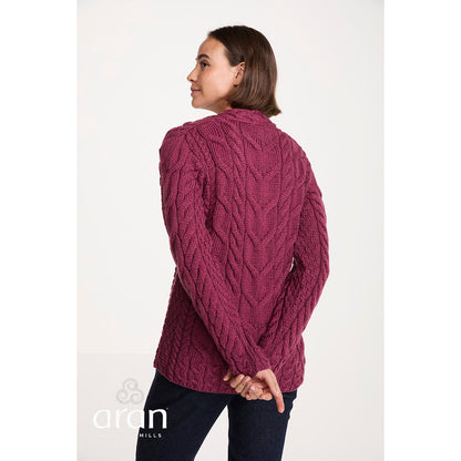Back view of a model wearing the berry Tralee V-Neck sweater showing the knit texture and relaxed fit.