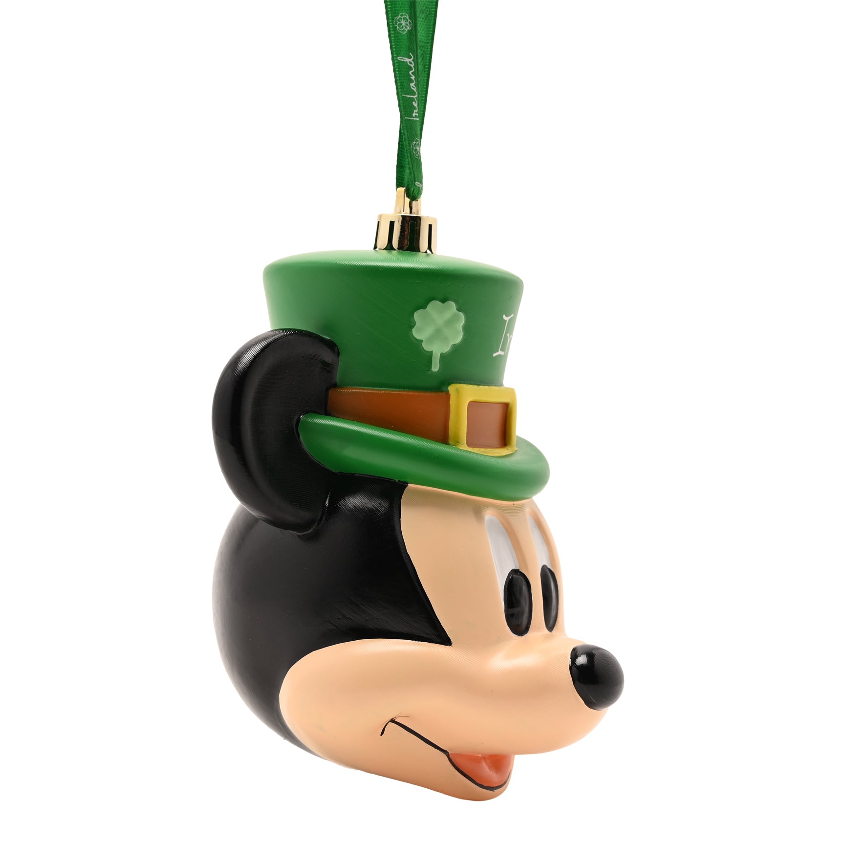 Side view of Mickey Mouse head ornament with a green leprechaun hat and brown belt and yellow buckle