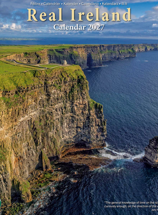 Cover of Real Ireland Calendar 2027 showing rugged cliff coastline and blue ocean.