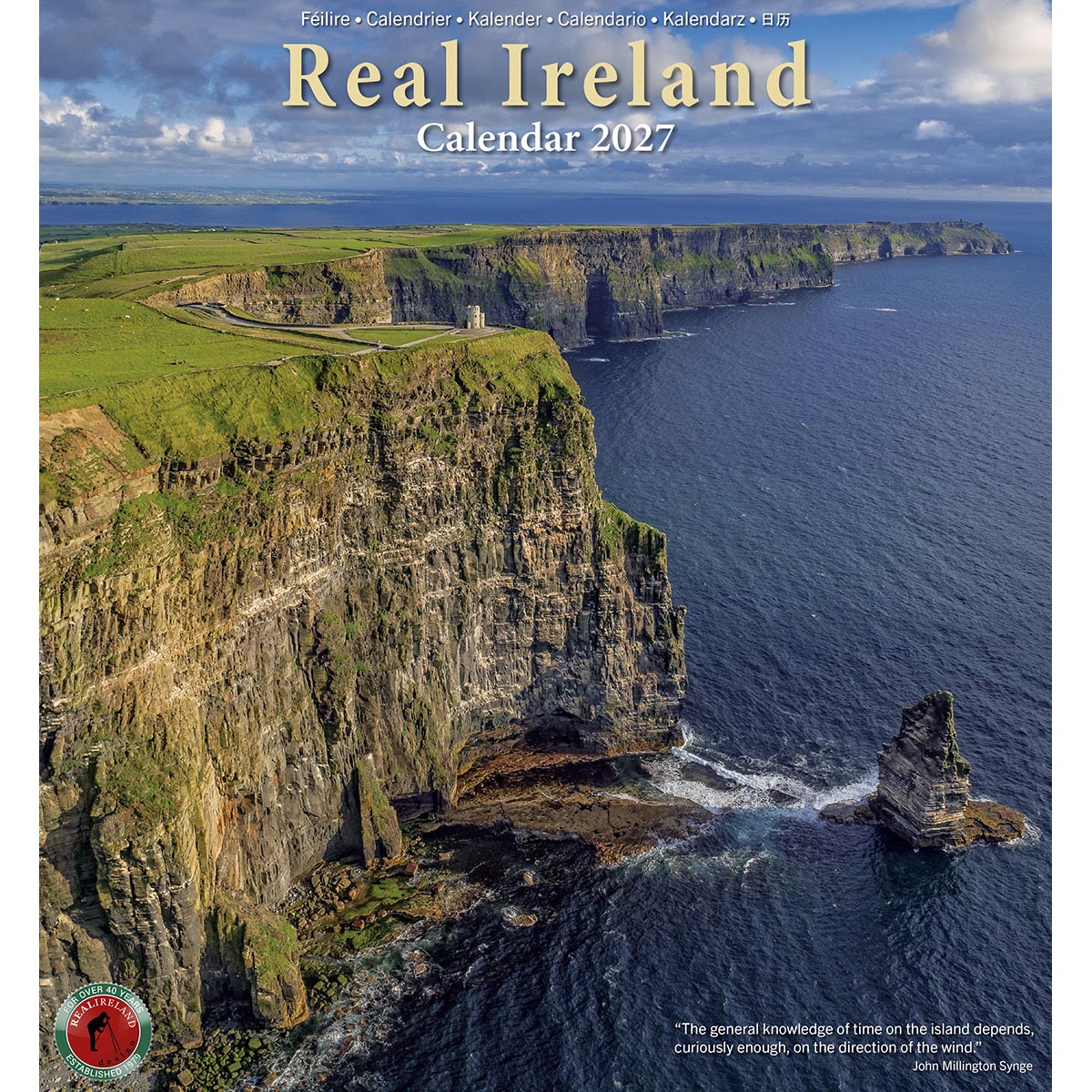 Cover of Real Ireland Calendar 2027 showing rugged cliff coastline and blue ocean.