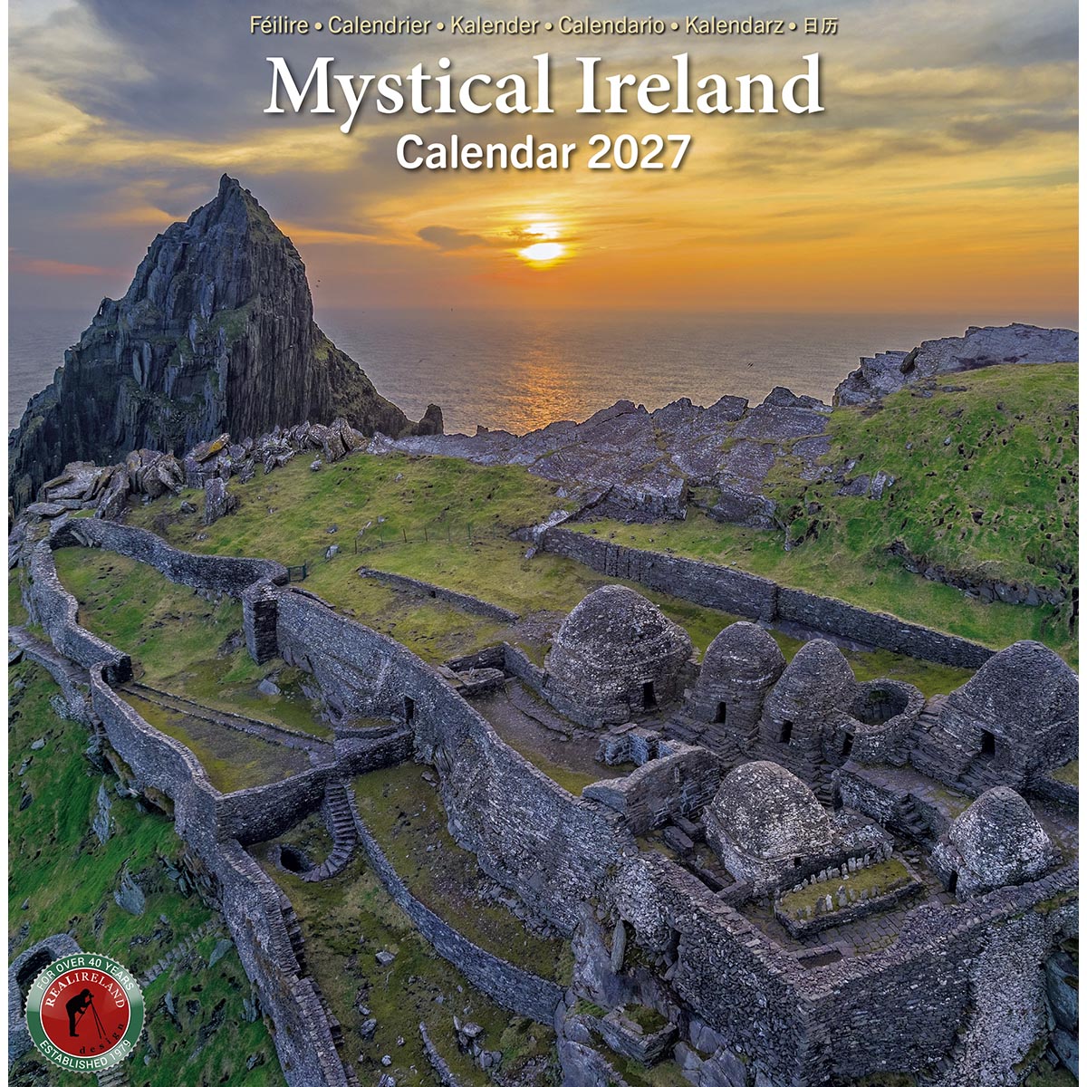 Mystical Ireland Calendar 2027 cover showing a sunset over a rugged coastal fortress on the Ring of Beara West Cork.