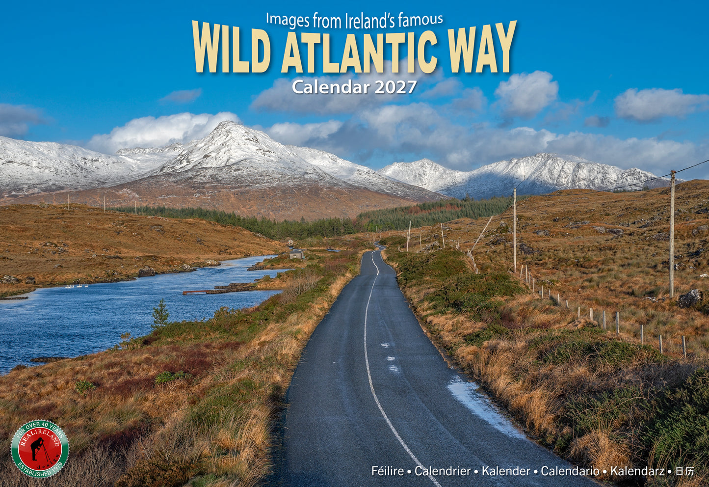 Cover of the Wild Atlantic Way Calendar 2027 showing a winding road through a rugged landscape with snow capped mountains