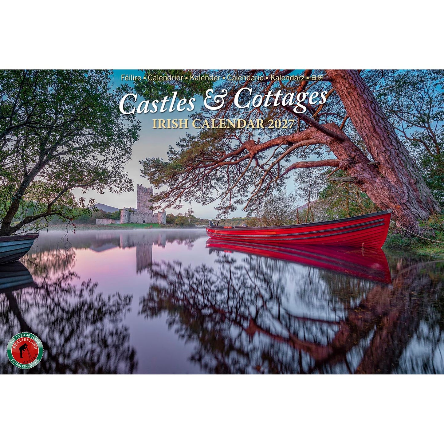 Castles & Cottages Irish Calendar 2027 cover showing a red boat on a calm lake with a distant castle and tree reflections