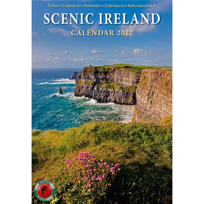 Scenic Ireland calendar 2027 cover featuring rugged coastal cliffs, blue sea, and green foreground with pink flowers