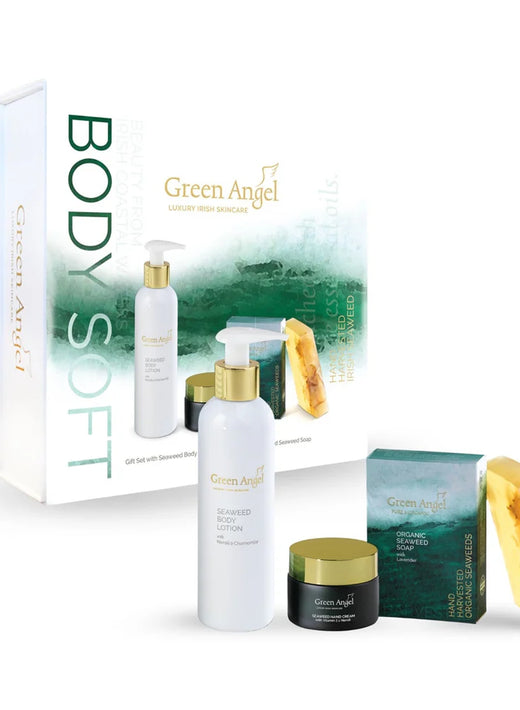 Skincare gift set with lotion, hand cream, soap, and packaging box