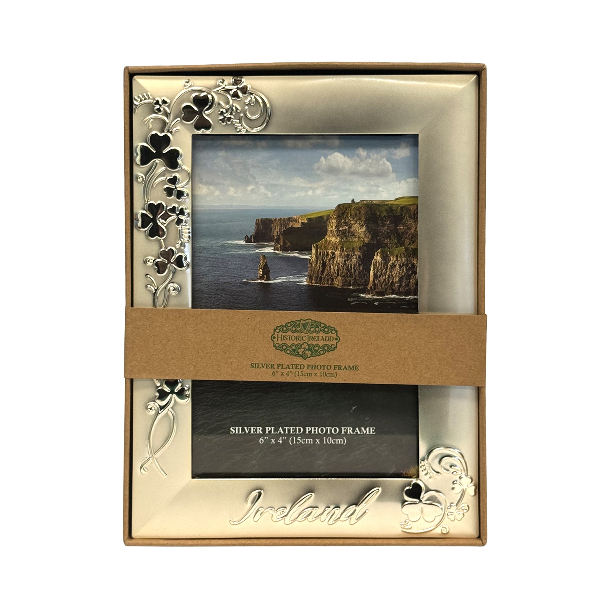 Silver plated photo frame with shamrock accents and Ireland inscription in its packaging
