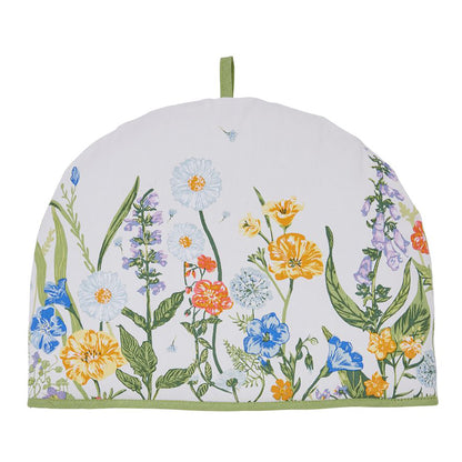 Cottage Garden Tea Cosy with a white background and colorful garden flowers along the bottom edge and a green loop.