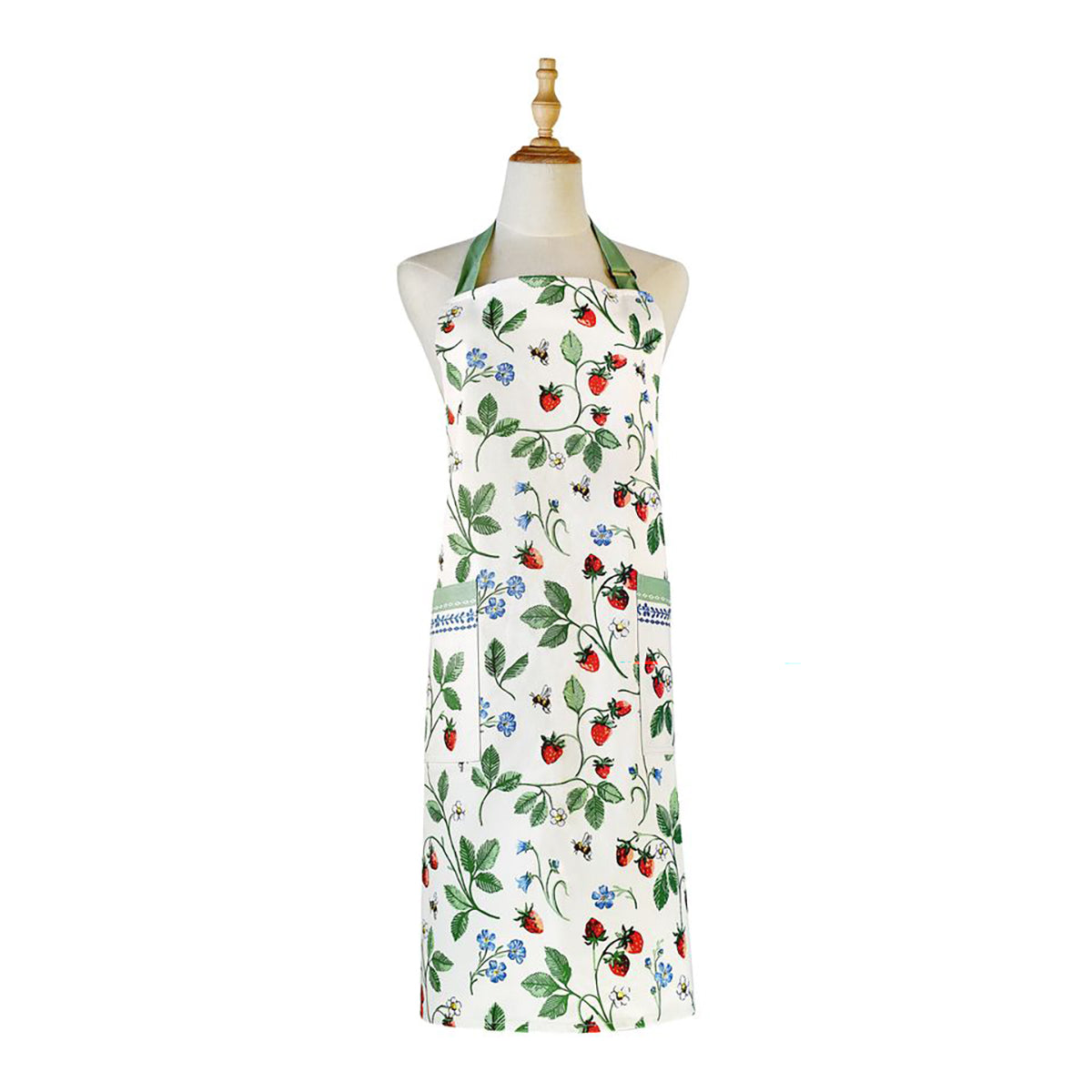 Strawberry Patch cotton apron on a dress form with green neck strap and floral print