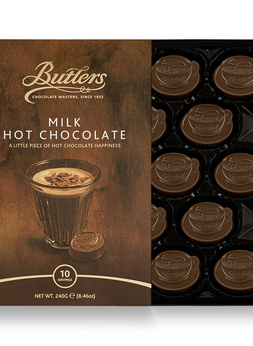 Box of milk hot chocolate discs with a glass of hot chocolate on packaging