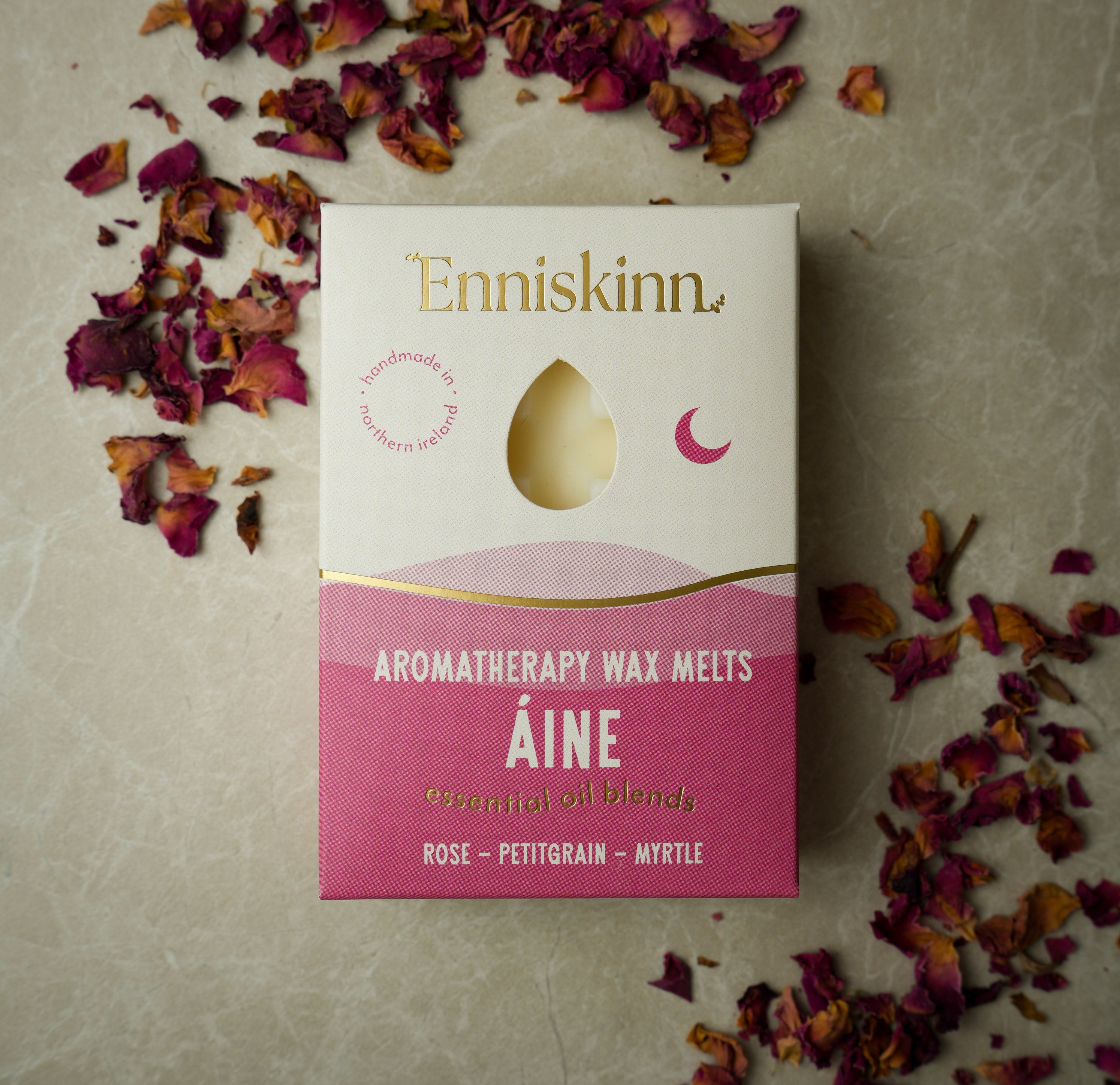 Enniskinn Aromatherapy Wax Melts Aine box with a tear window and pink lower panel