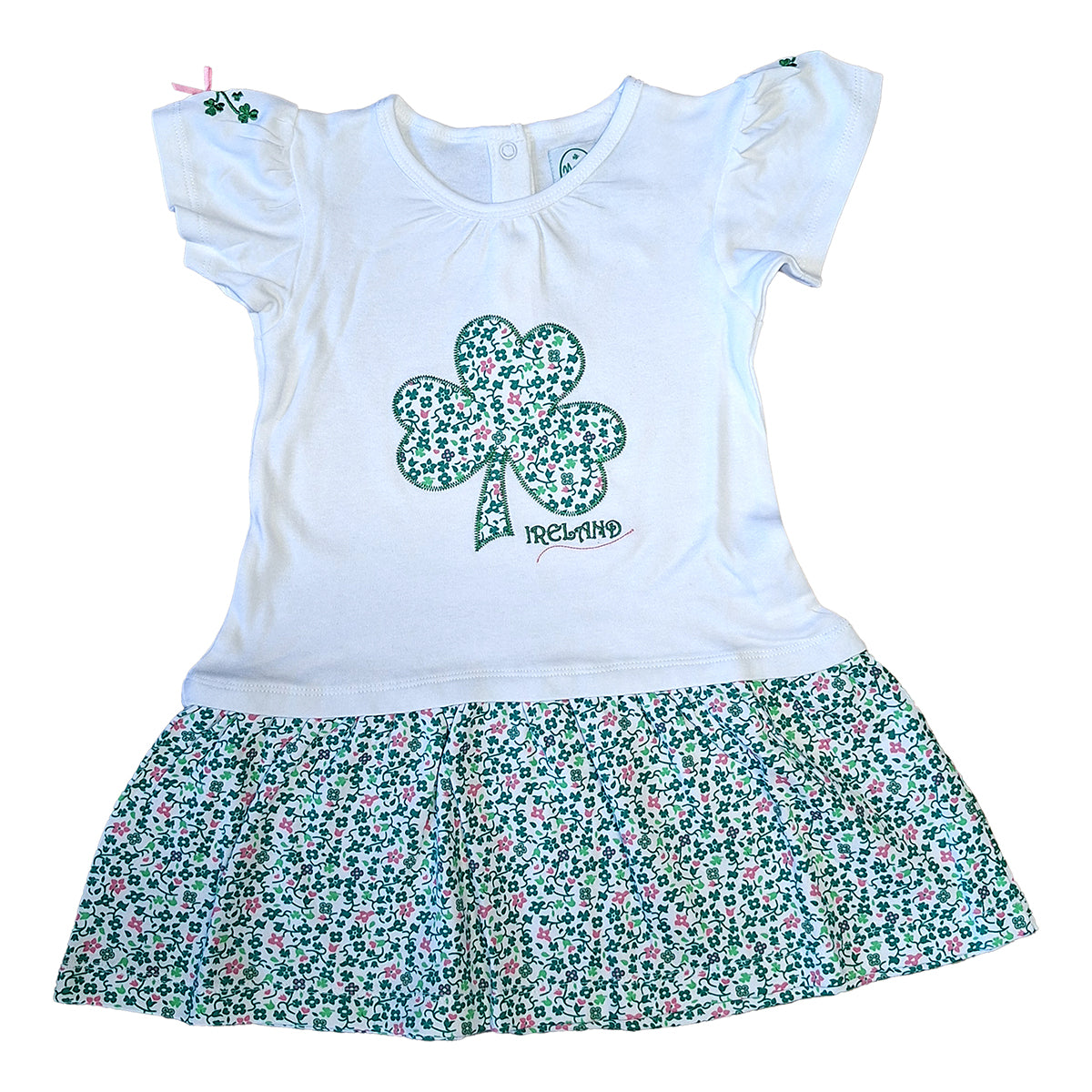 White kids dress with shamrock applique on the bodice and a floral print frill skirt
