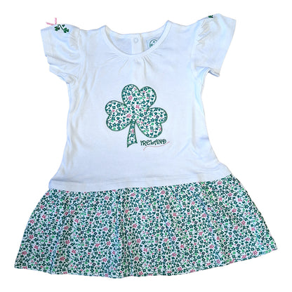 White kids dress with shamrock applique on the bodice and a floral print frill skirt