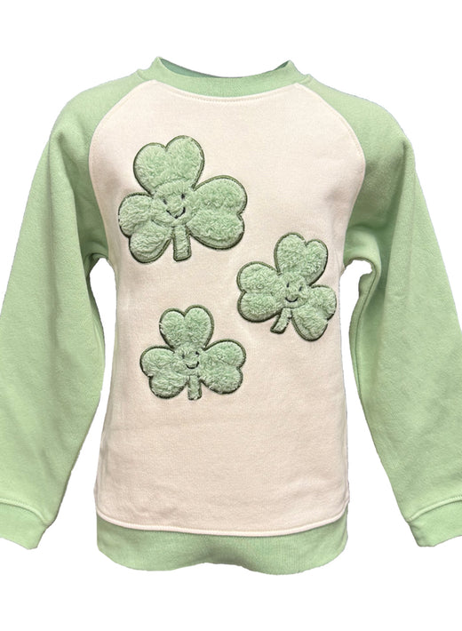 Cream and mint green plush sweatshirt with three shamrock patches on the front