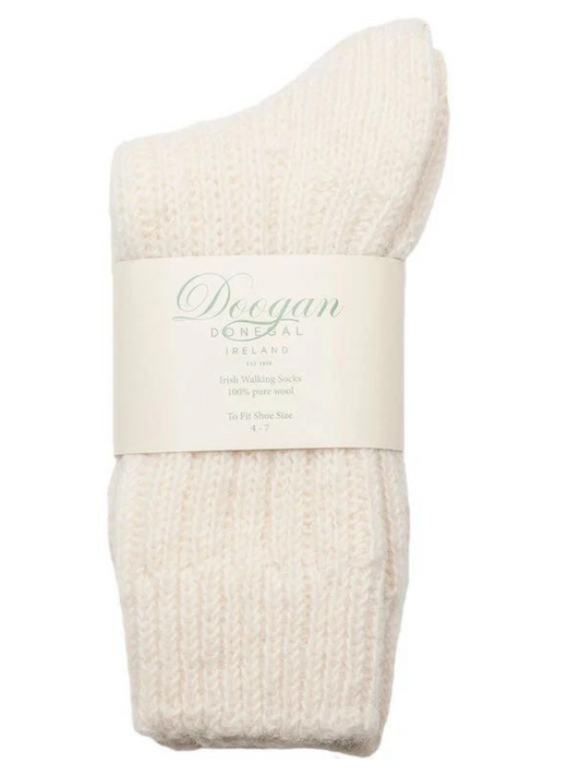 Pair of cream-colored thick knitted wool walking socks folded