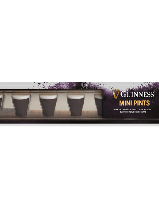 Box containing six mini pint-shaped chocolates with creamy tops