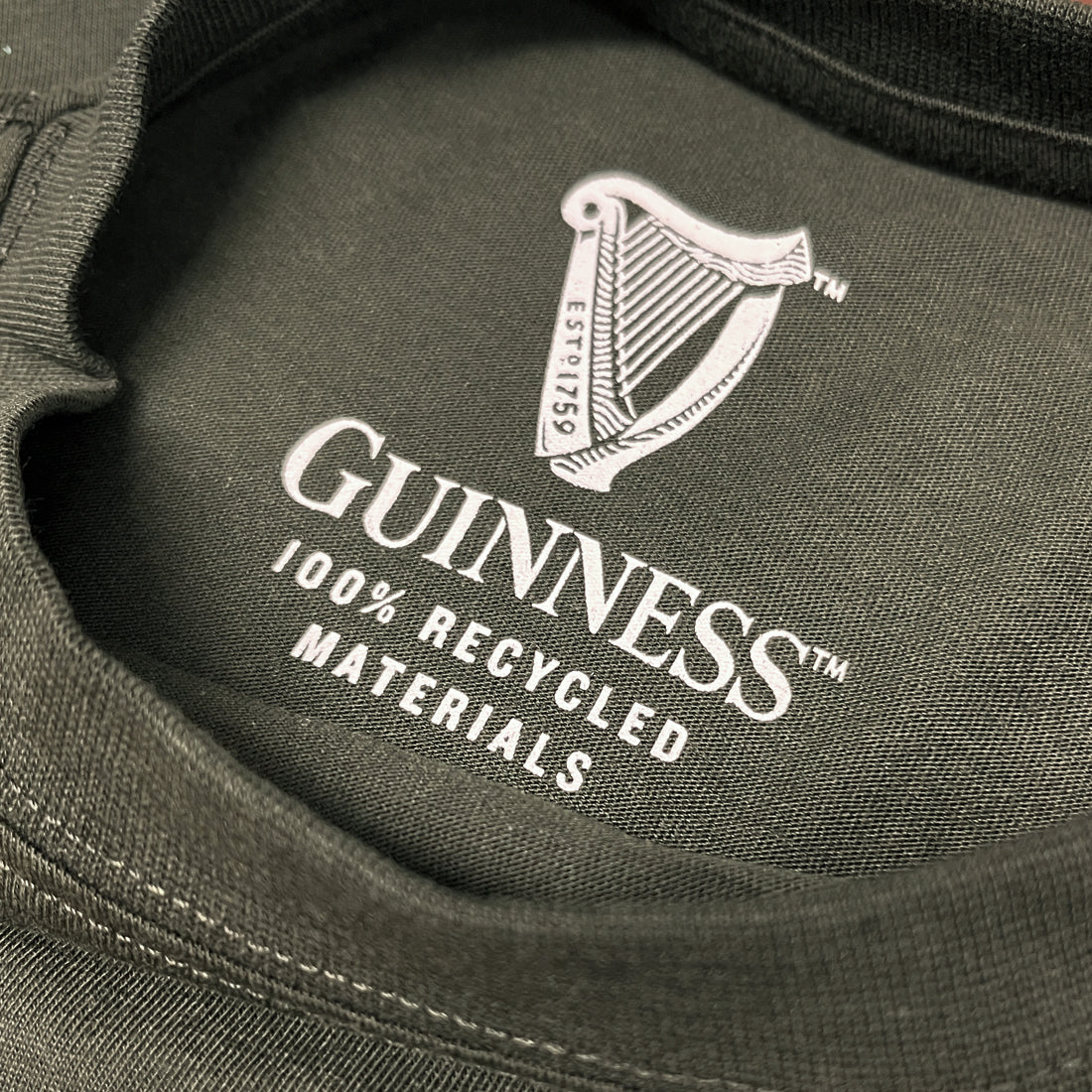 Guinness logo and 100% recycled materials label on the inside neck of the shirt.
