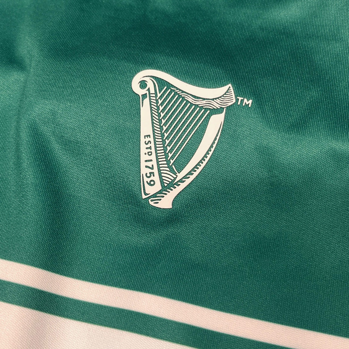 Guinness Green & White Striped Football Top