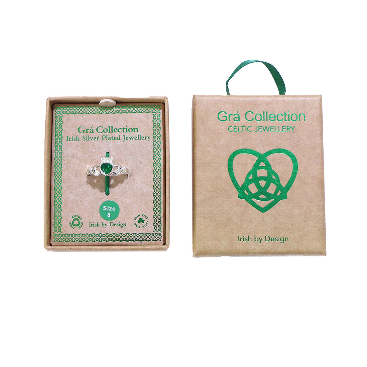 Silver plated ring with green heart stone in cardboard box packaging