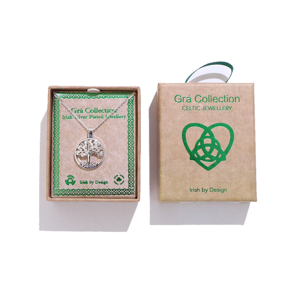 Grá Collection Celtic Jewellery tree of life necklace in a brown presentation box with green logo