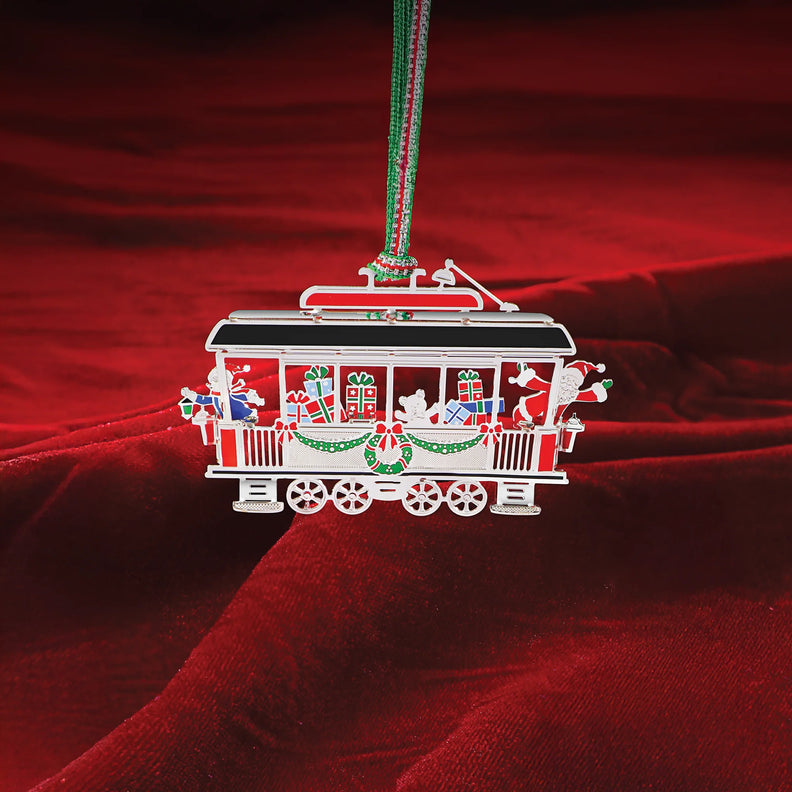 Christmas trolley ornament decorated with gifts and holiday figures
