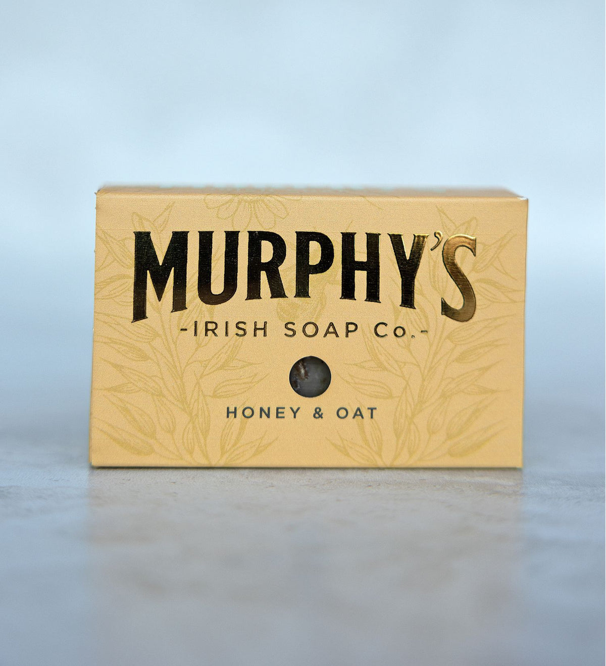 Yellow soap box labeled Murphy's Irish Soap Co. Honey & Oat