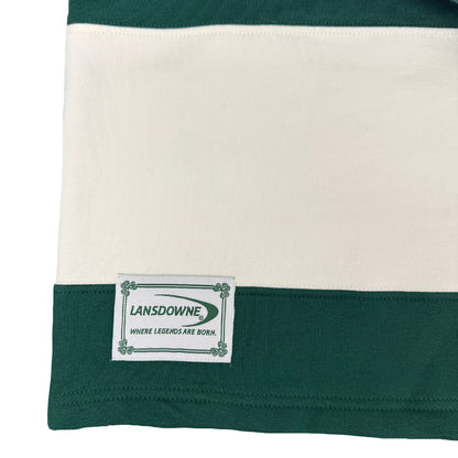 Close up of the striped rugby shirt hem featuring a Lansdowne patch.
