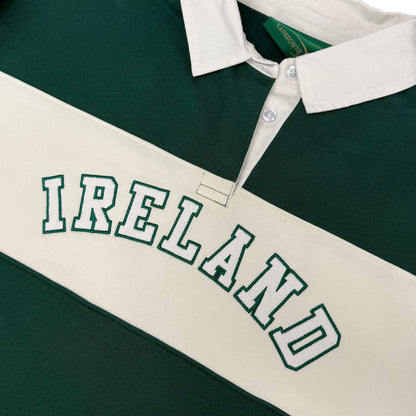 Close up of green and cream striped Lansdowne Ireland rugby shirt with IRELAND embroidery