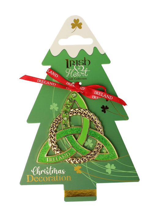 Green Christmas tree shaped card displaying a glittery gold Trinity knot metal decoration with a red Ireland ribbon