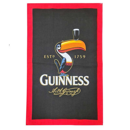 Black cloth with red border featuring a toucan and Guinness text