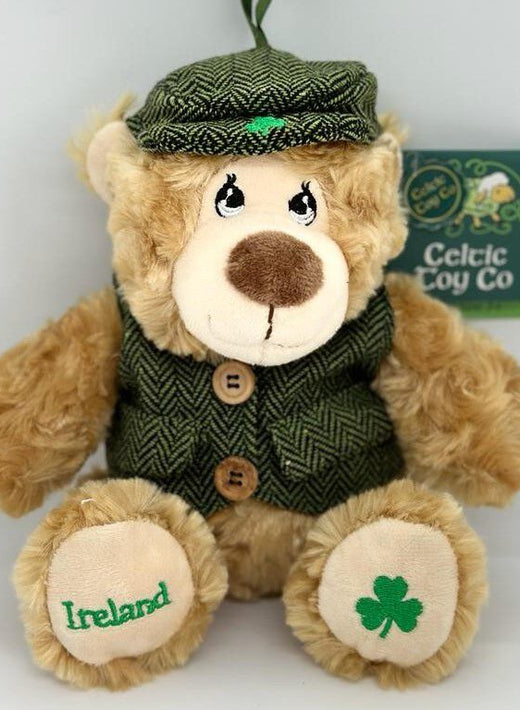 Teddy bear wearing green tweed vest and cap with shamrock and Ireland embroidery