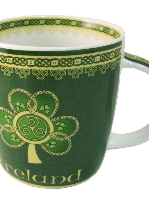 Green mug with Celtic knot designs and shamrock tree pattern