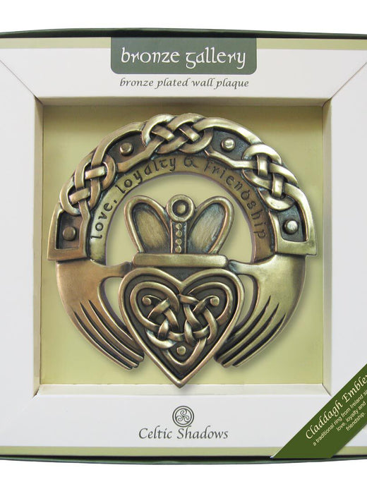 Bronze Claddagh emblem with heart, crown, and hands in decorative box