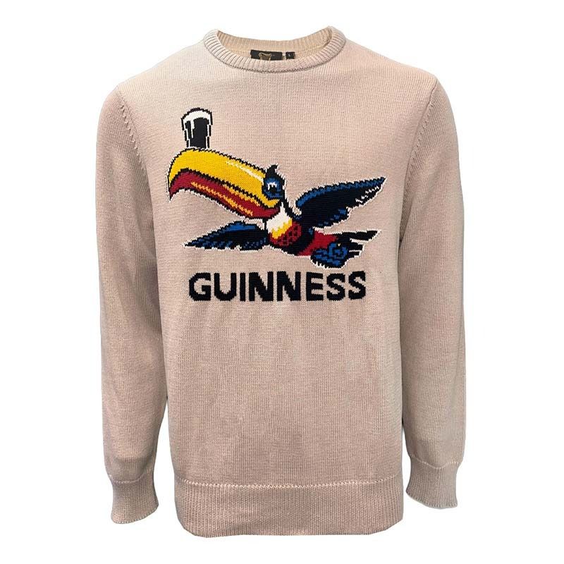 Beige knitted crew neck jumper featuring a flying toucan graphic and the Guinness wordmark